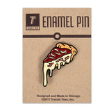 A enamel pin of a deep dish pizza on a brown cardboard backing.
