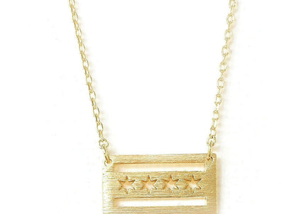 A gold-colored necklace featuring a pendant shaped like the Chicago flag with a brushed texture.
