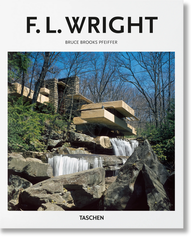 Cover of the book 'F. L. Wright' featuring a home in the woods, overlooking a flowing waterfall.