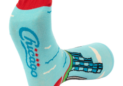 Light blue sock with red accents and 'Chicago' text on bottom of foot
