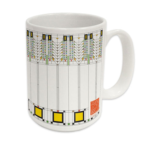 A white ceramic mug with a geometric pattern design inspired by Frank Lloyd Wright's Tree of Life.