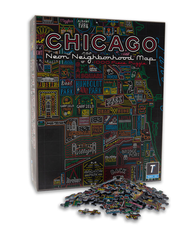 A jigsaw puzzle box with a colorful map of Chicago neighborhoods on it, along with a few scattered pieces.