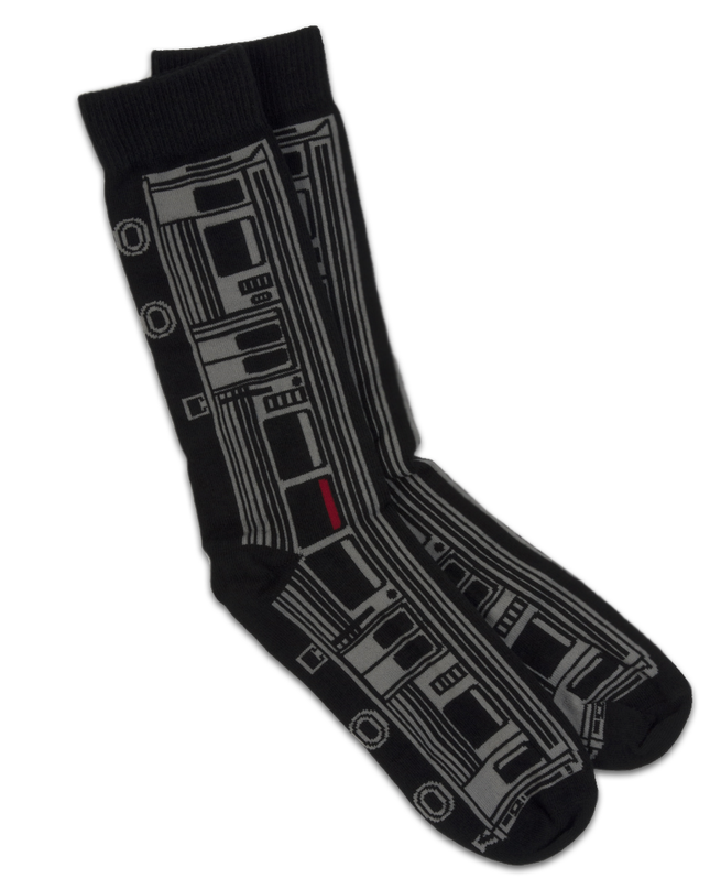 A pair of black socks featuring a design of a grey "L" train car.