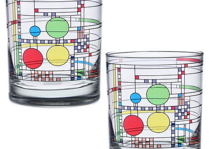 A set of two clear double old-fashioned glasses with a geometric pattern inspired by Frank Lloyd Wright's design from the Coonley Playhouse.