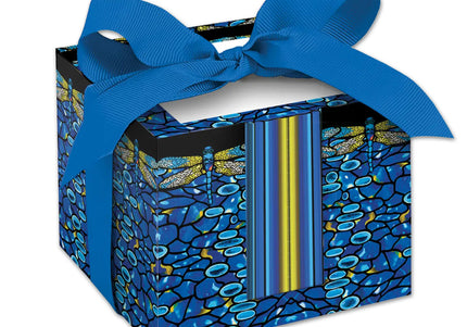 A rectangular note cube with a vibrant blue and yellow dragonfly design on a black background, adorned with a blue ribbon.