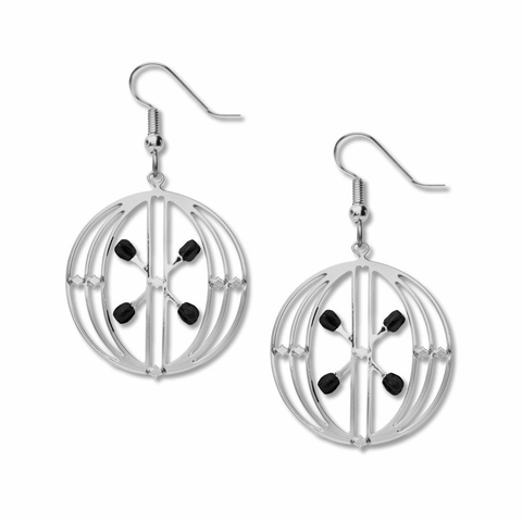 A pair of silver-colored earrings featuring a circular geometric pattern with black glass beads, designed to resemble an elevator door.