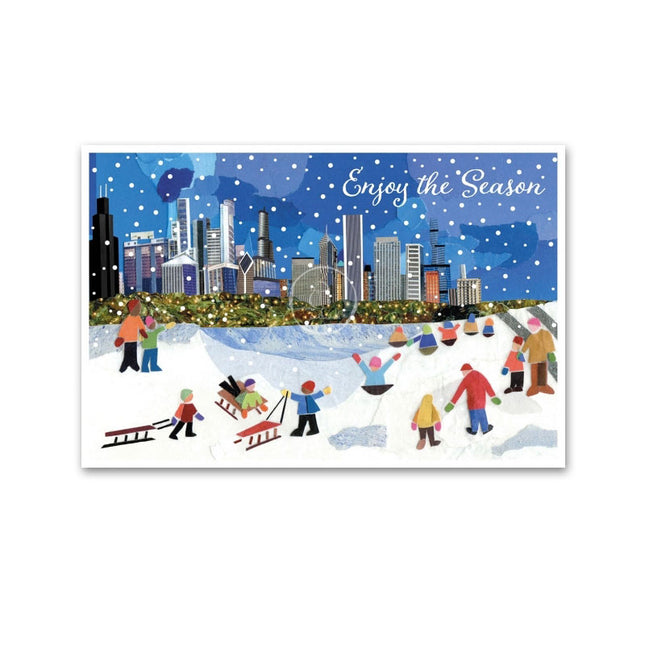 A holiday card featuring a colorful illustration of people sledding with a Chicago skyline background, and the text 'Enjoy the Season'.