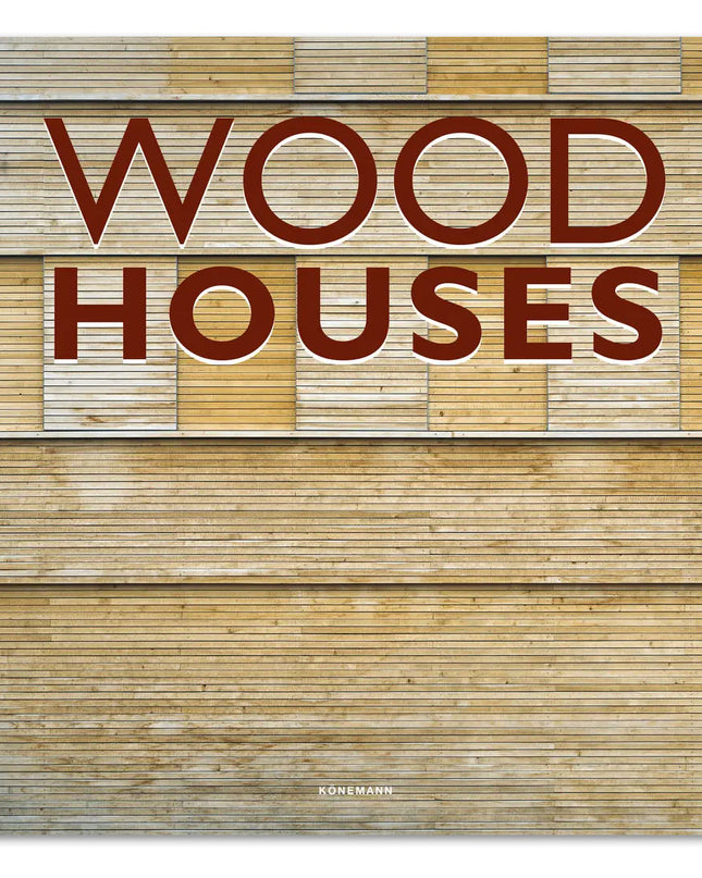Cover of the hardcover book titled 'Wood Houses', featuring a wooden texture background with the title text in a large font.