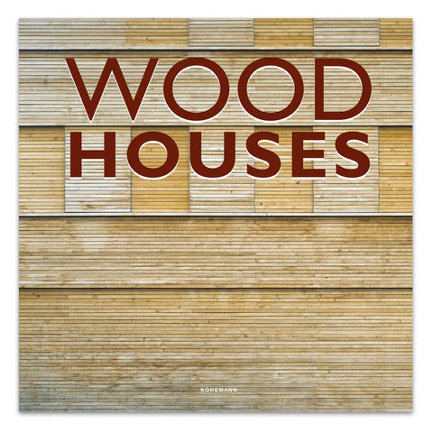 Cover of the hardcover book titled 'Wood Houses', featuring a wooden texture background with the title text in a large font.