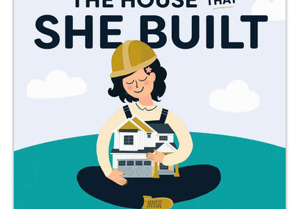 Cover of the children's book 'The House that She Built' featuring an illustration of a young girl in a hard hat construction hat, sitting and holding a house under construction.